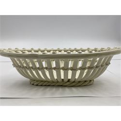 19th century Creamware woven basket with beaded border and twisted food, bearing hand-written label 'Leeds' and impressed W, together with a naively potted Creamware plate, having three lattice woven reserves on a relief moulded ground, D13.5cm