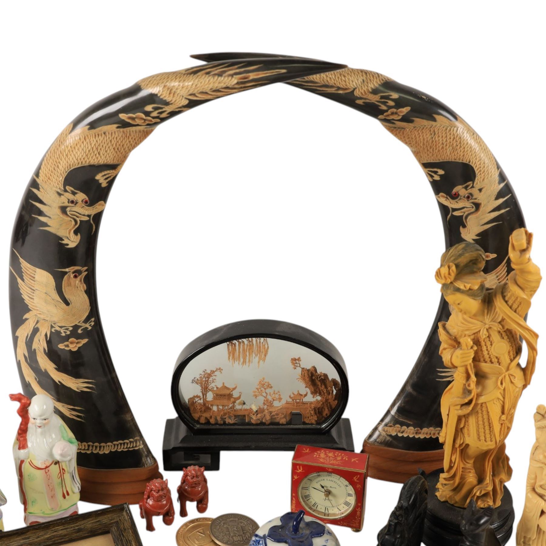 Pair of carved horns, decorated with dragons and birds, together with ceramic figures and other collectables 