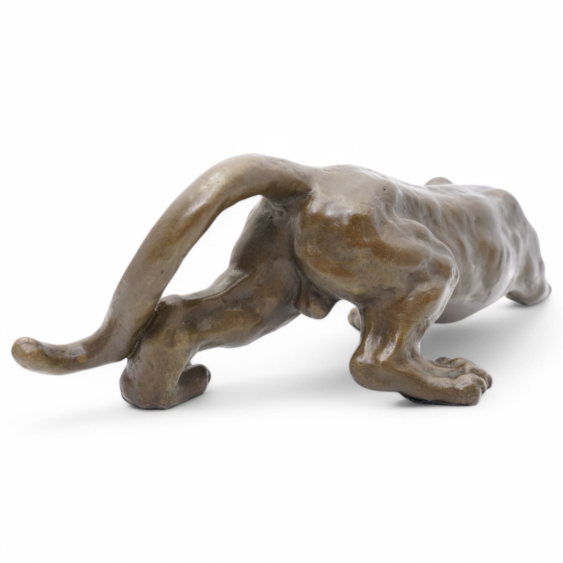 Bronze figure, modelled as a cougar or panther in crouching pose, signed Milo and also bearing foundry mark, L40cm