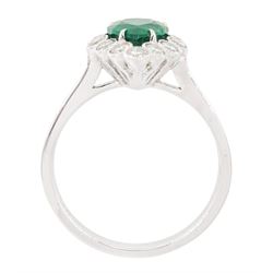 18ct white gold emerald and diamond cluster ring, single pear cut emerald of approx 1.40 carat, surrounded by twelve round brilliant cut diamonds, in a milgrain setting, stamped 750, total diamond weight approx 0.55 carat