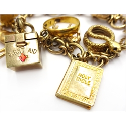  9ct gold fancy link charm bracelet with 22ct gold ring and 9ct gold charms including camera, first aid box, seal etc  