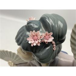 Lladro figure, Madame Butterfly, modelled as a woman holding fans, no 4991, together with two Lladro candle holders, Sailing the Seas no 17665, Lladro 1994 easter egg no 17532, and a Lladro plaque, largest example H30