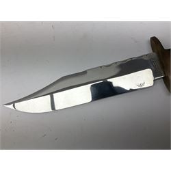 Large Bowie knife the 21cm steel blade marked J.E. Middleton & Sons Rockingham Street Sheffield with brass cross-piece and polished horn grip scales; in leather sheath L36cm overall