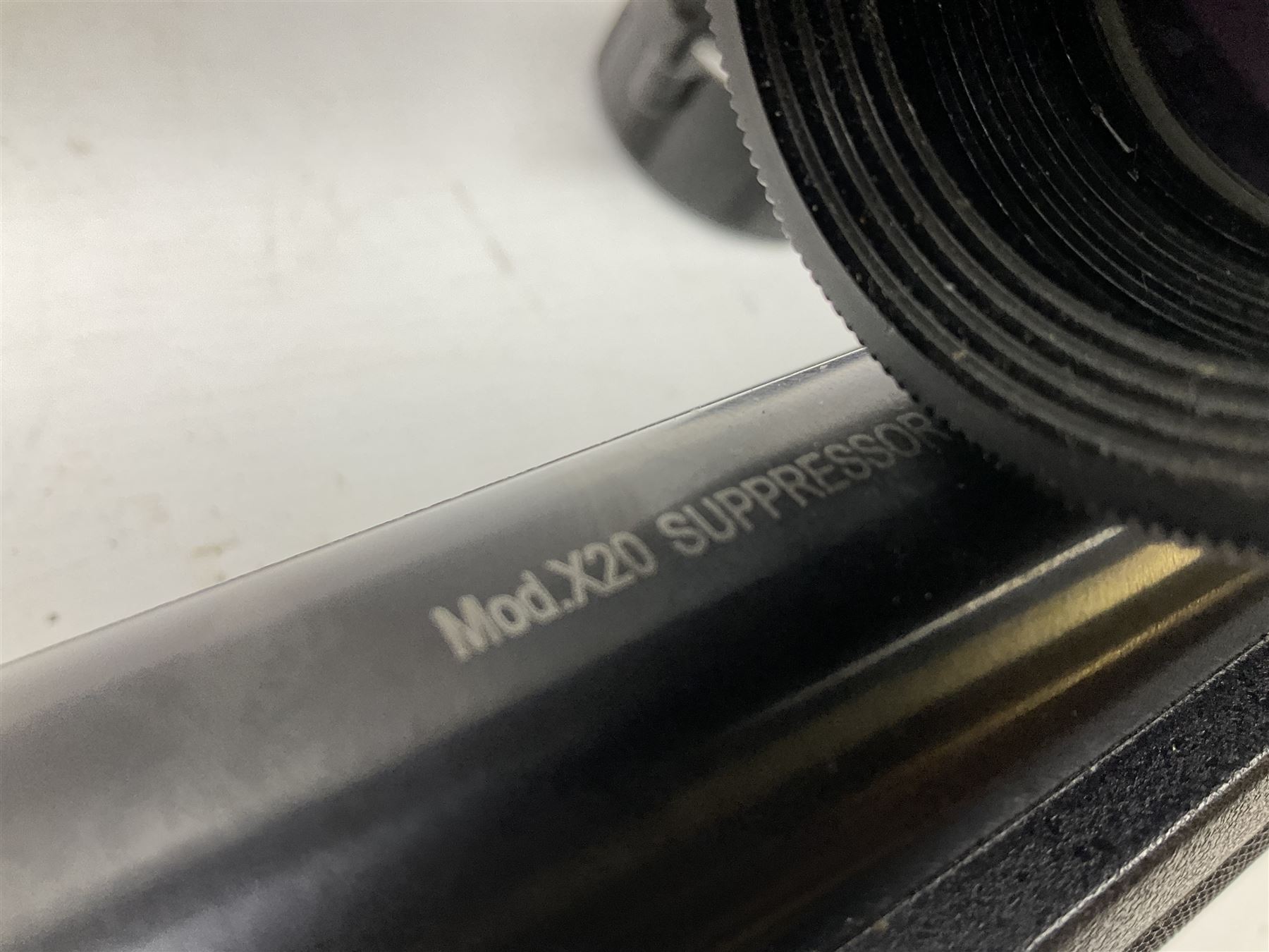 Stoegar .177 air rifle with break barrel action, 3 x 9 telescopic sight and fully integrated sound moderated barrel, no visible serial number, L109cm; in Stoeger lined gun sling