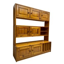 Mid-20th century pitch pine wall unit, fitted with assorted shelves and cupboards 