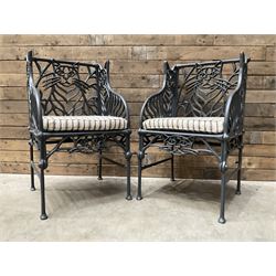 Richard Bawden (1936-2024): Pair of Cat design painted cast iron garden armchairs