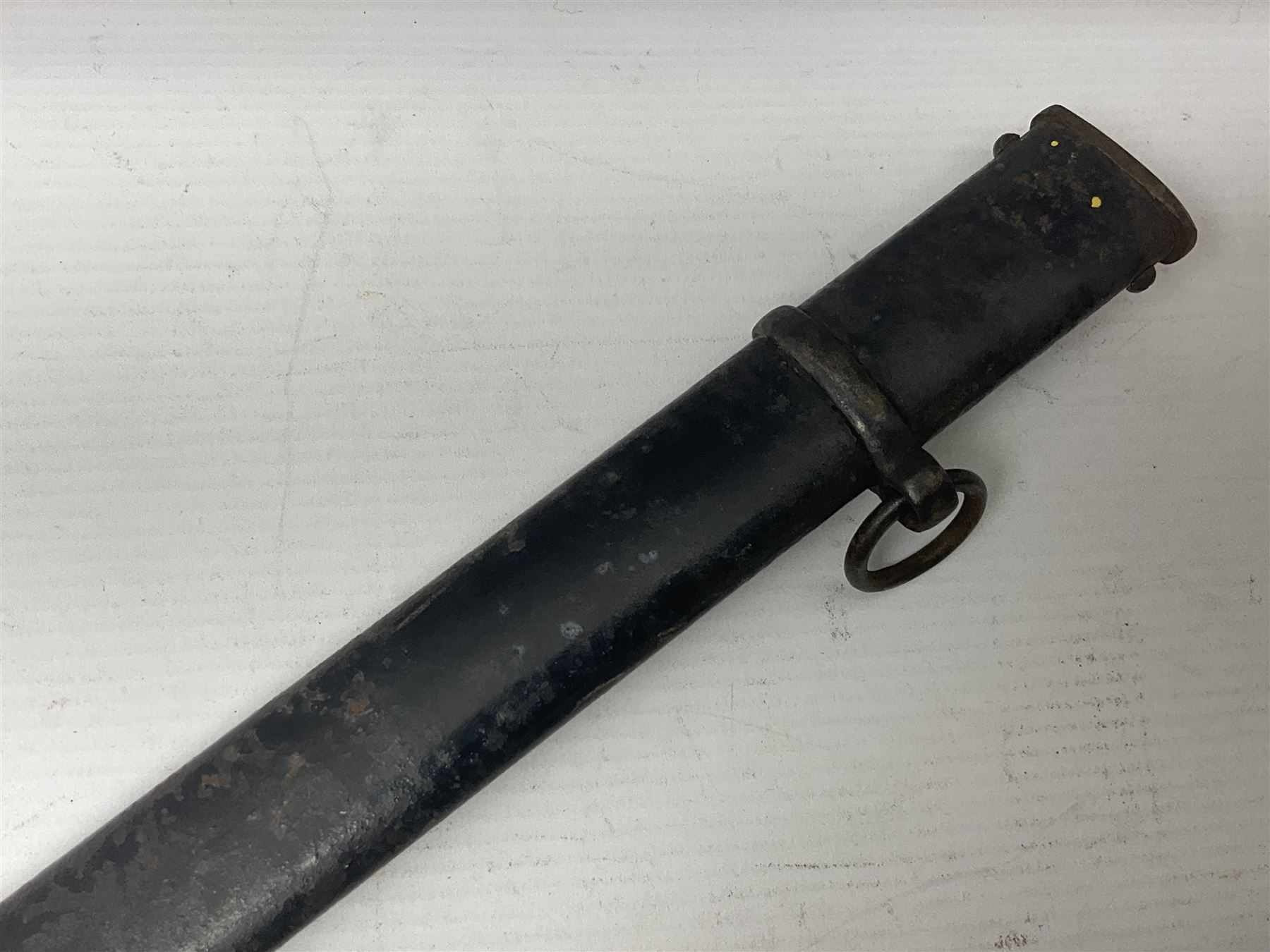 Prussian artillery officer's sword, with 80cm slightly curving fullered  blade, brass hilt with D-shaped langets, curving knucklebow, wire-bound black grip and leather finger loop; in black painted steel scabbard with single suspension loop