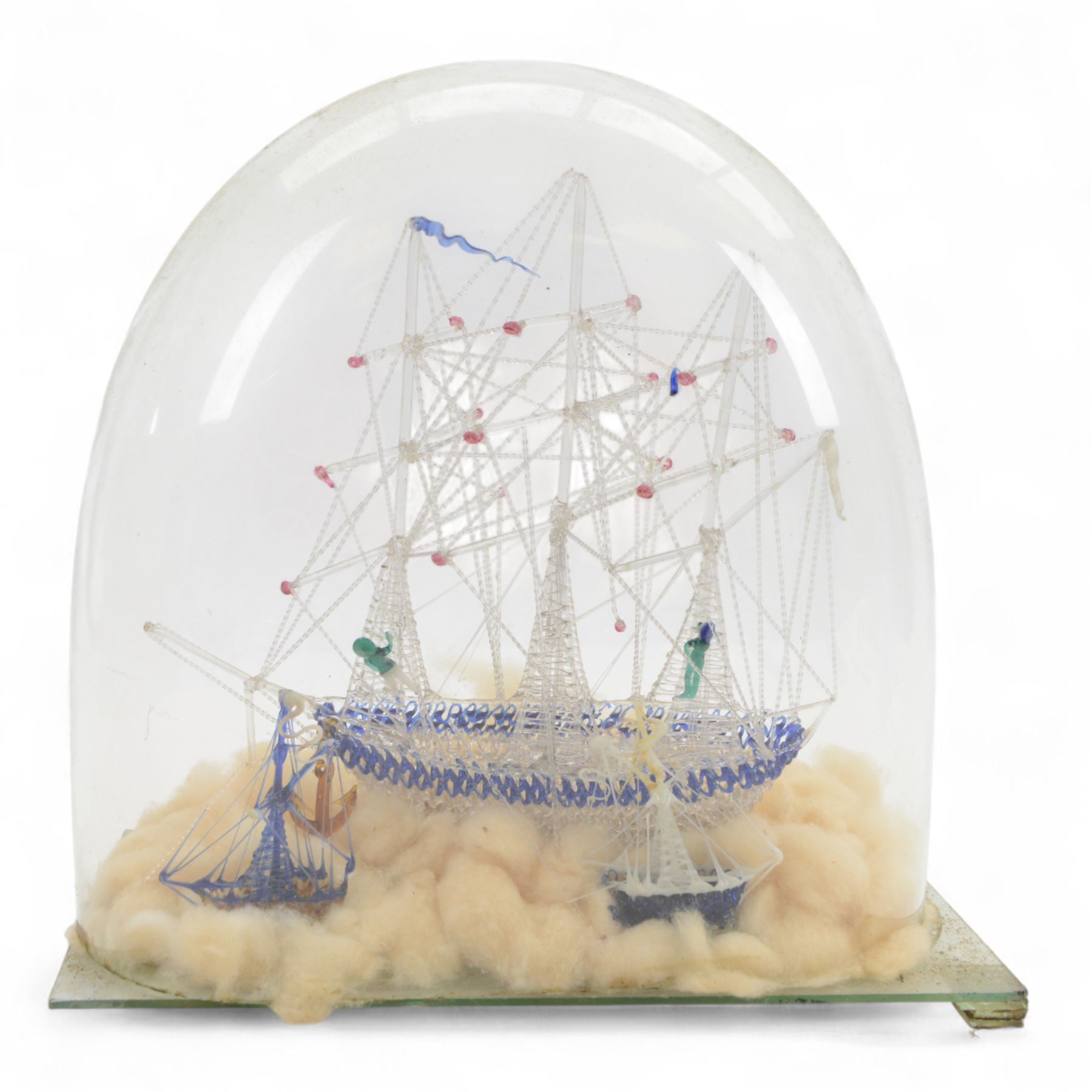 Victorian glass frigger of a three mast ship and a smaller ship under a glass dome, H38cm