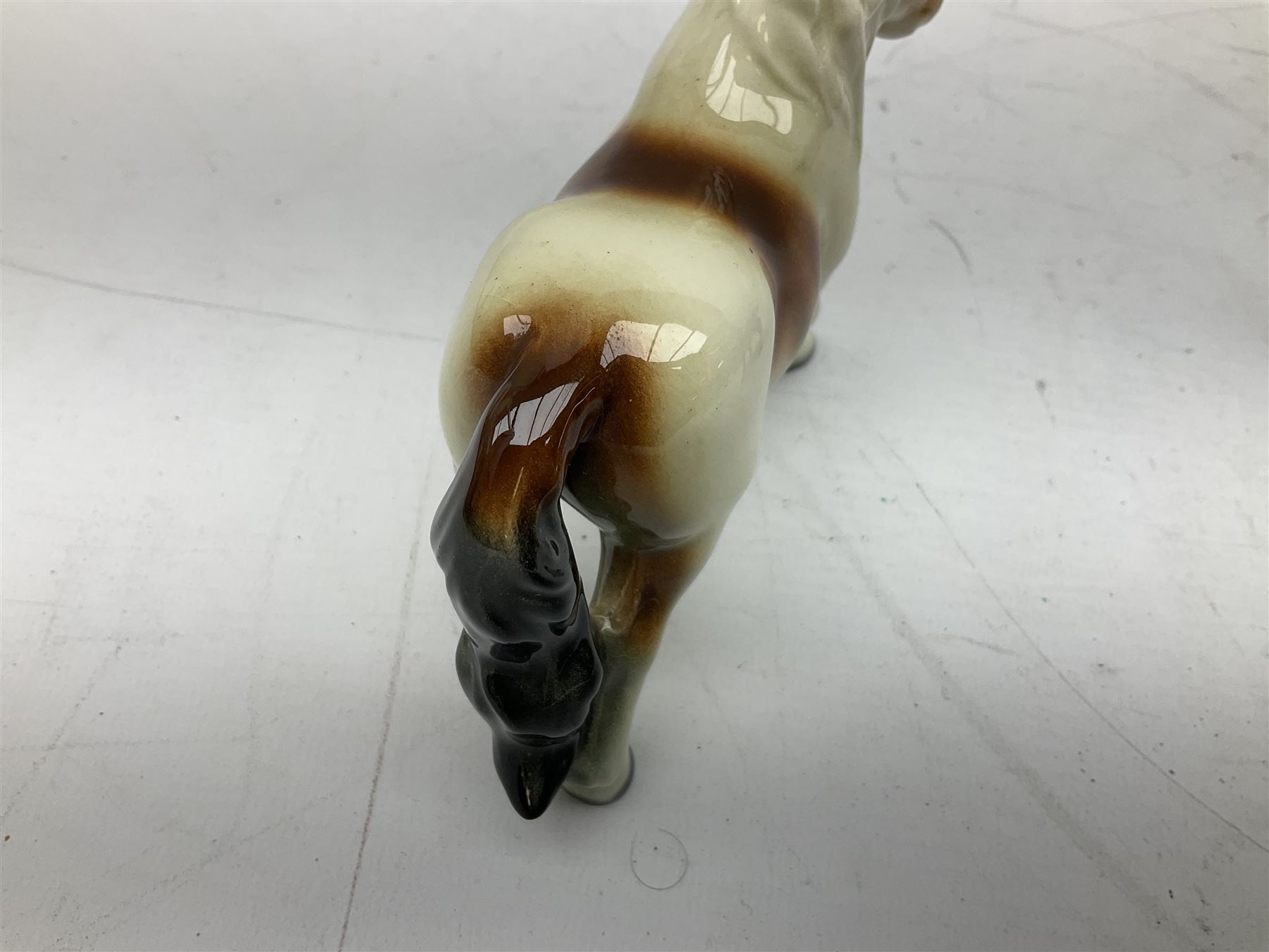 Seven Beswick figures of horses, including Connemara pony in grey no.1641, Arab in bay no.1265, large foal in grey no.947 etc, together with a Goebel figure of a horse (8)