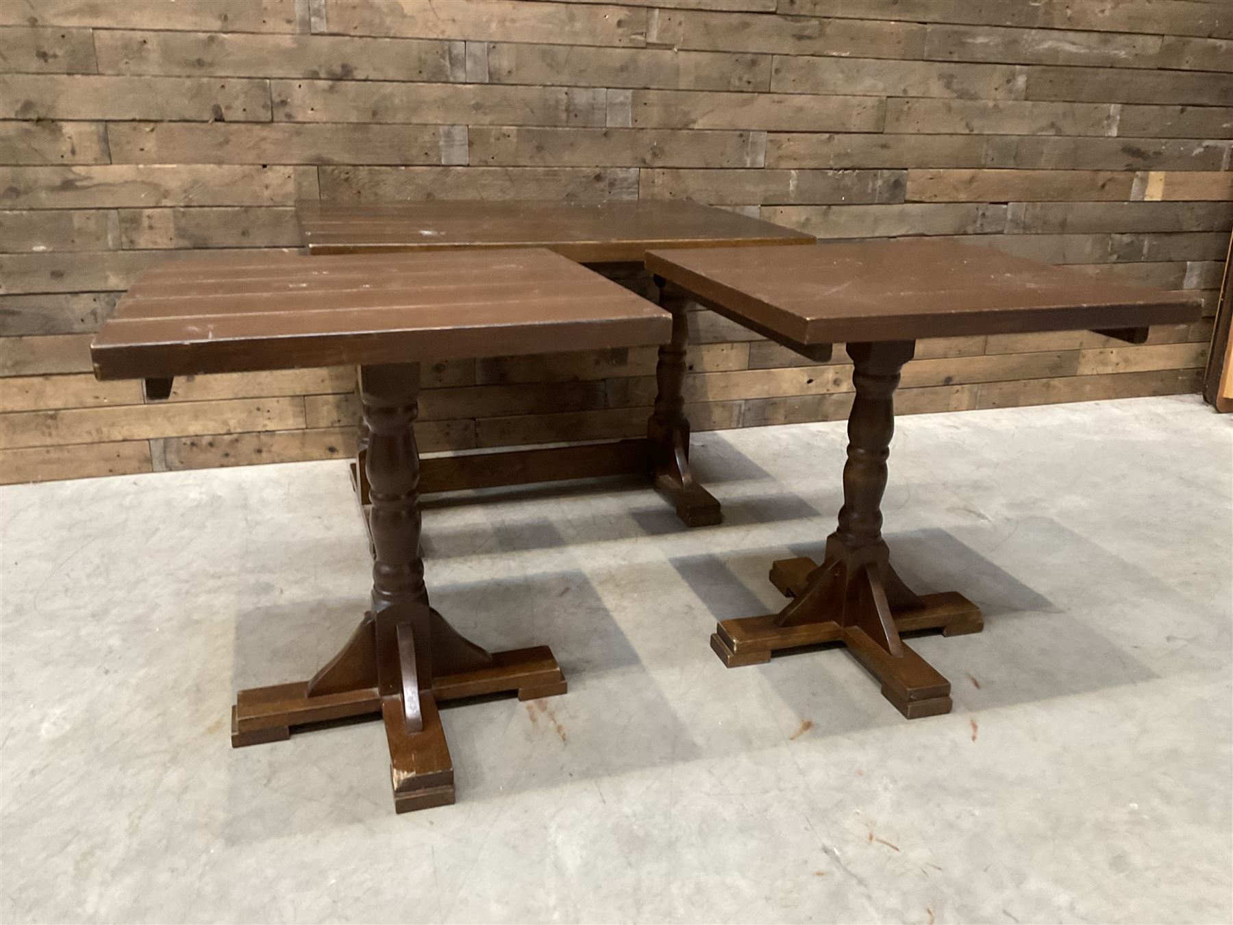 Single oak rectangular table on turned supports joined by a single stretcher (W110cm, D80cm, H75cm) and two similar square pedestal tables (W70cm, D70cm, H76cm) (3)