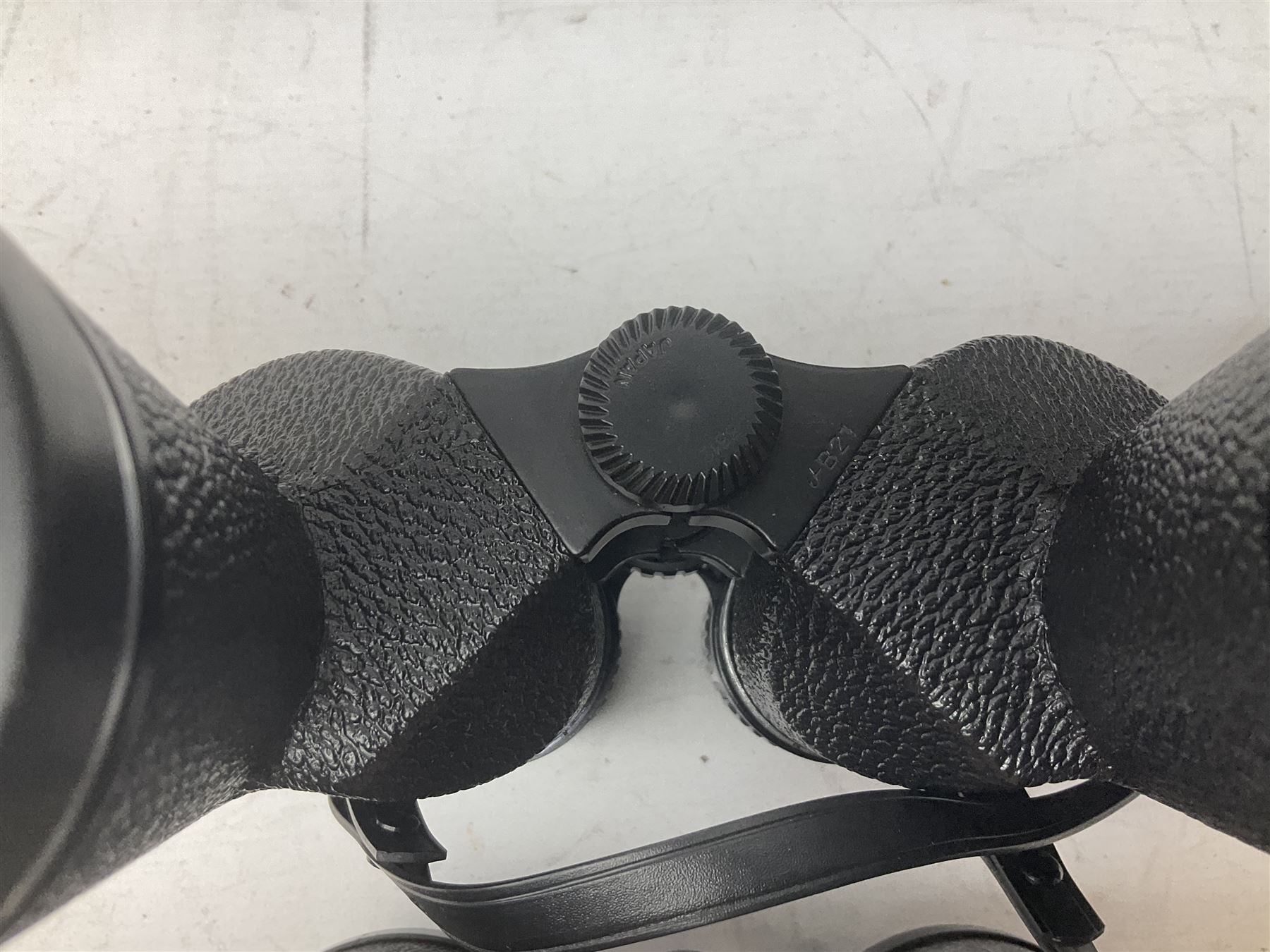 Nine cased pairs of binoculars to include Lieberman & Gortz 12x50, Frank Nipole 8x56, Uniscope, Hoya mark II 8x40, Porst 8x56 etc