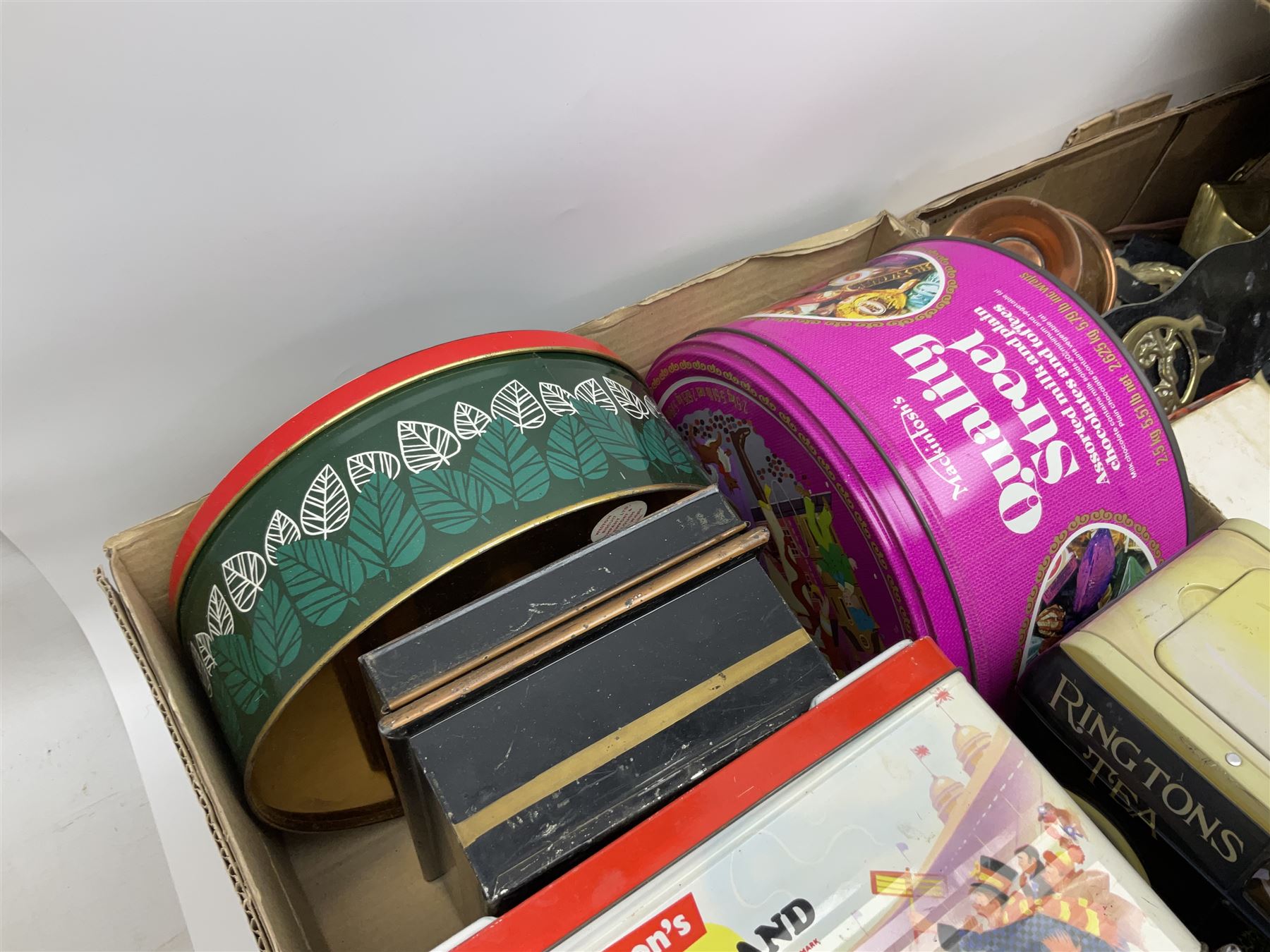 Collection of silver plated cased cutlery including part canteens and butter knives, together with other metal ware including J&J Siddons iron, horse brasses and a copper kettle, 1970s children's annuals including Beano, two handbags and three suitcases, vintage tins etc, in four boxes 