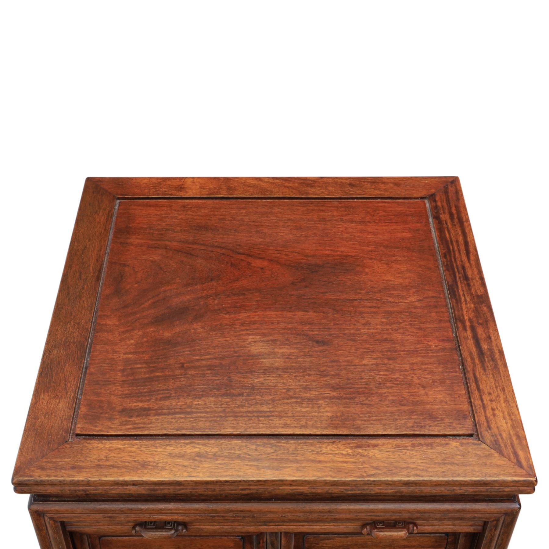 Early 20th century Chinese hardwood filing cabinet, moulded rectangular top over a tambour shutter front with twin recessed handles enclosing an arrangement of graduated drawers, raised on short cabriole legs with shaped apron