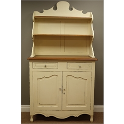  Laura Ashley rustic cream painted and mahogany dresser, raised shaped back with two shelves, two drawers and two cupboards to base, W107cm, H193cm, D43cm  