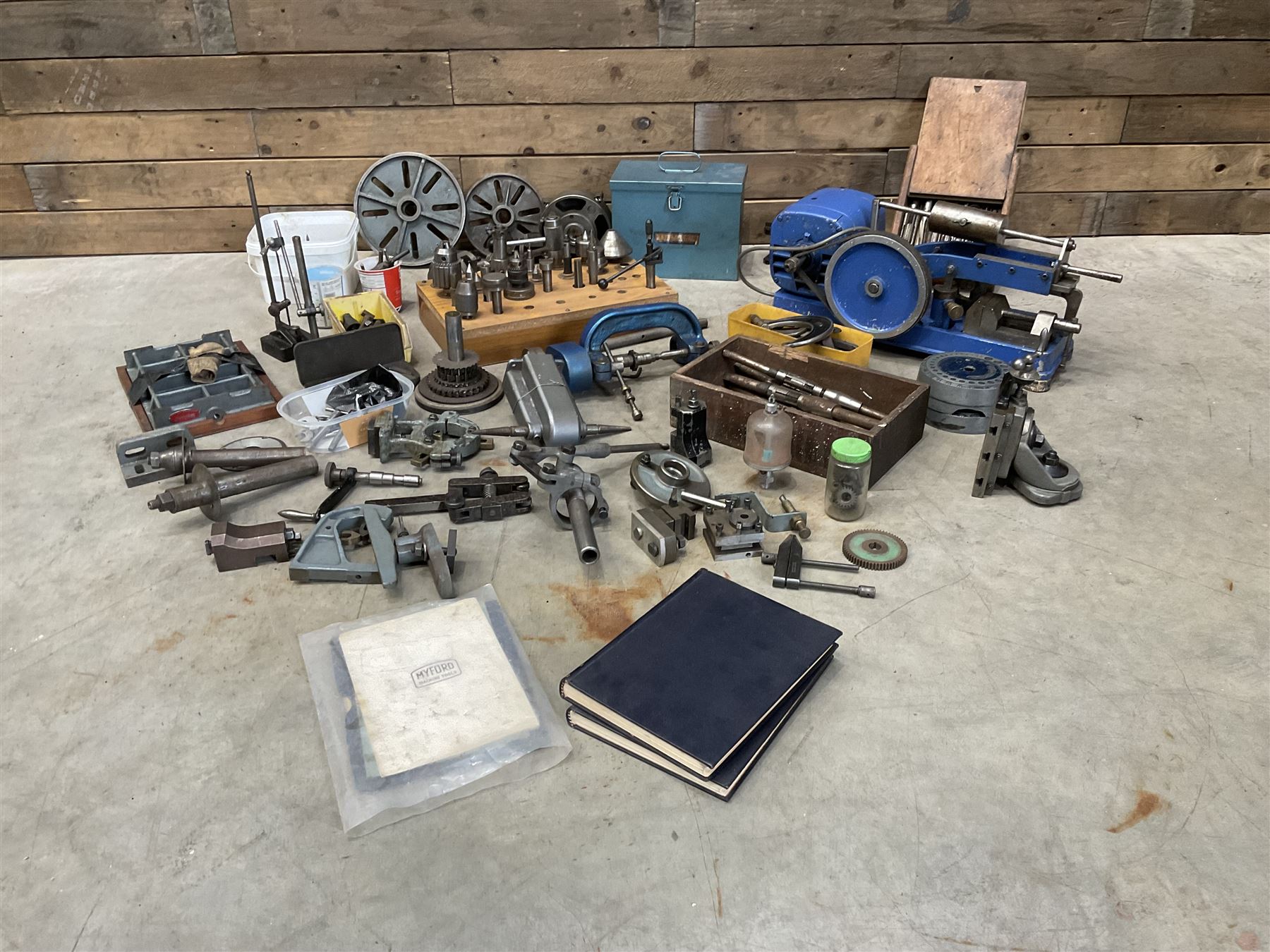 Myford Super 7 metal turning lathe with extensive collection of attachments, chucks, collets, bits; and precision metal saw