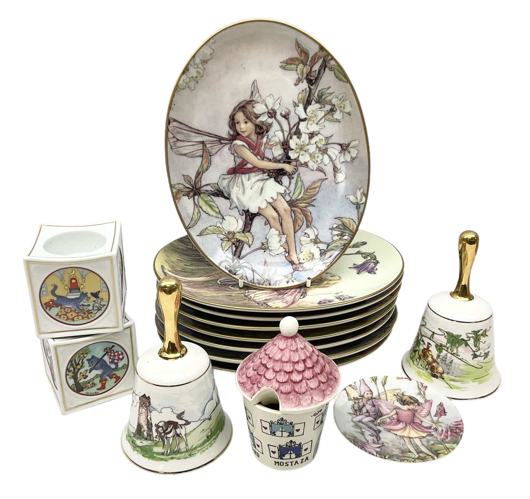 Royal Worcester Flower Fairies oval collectors plates, Goebel mustard pot, two Danbury Mint Fairy Tale bells, and pair of Hutschenreuther candlesticks decorated with scenes of Puss in Boots