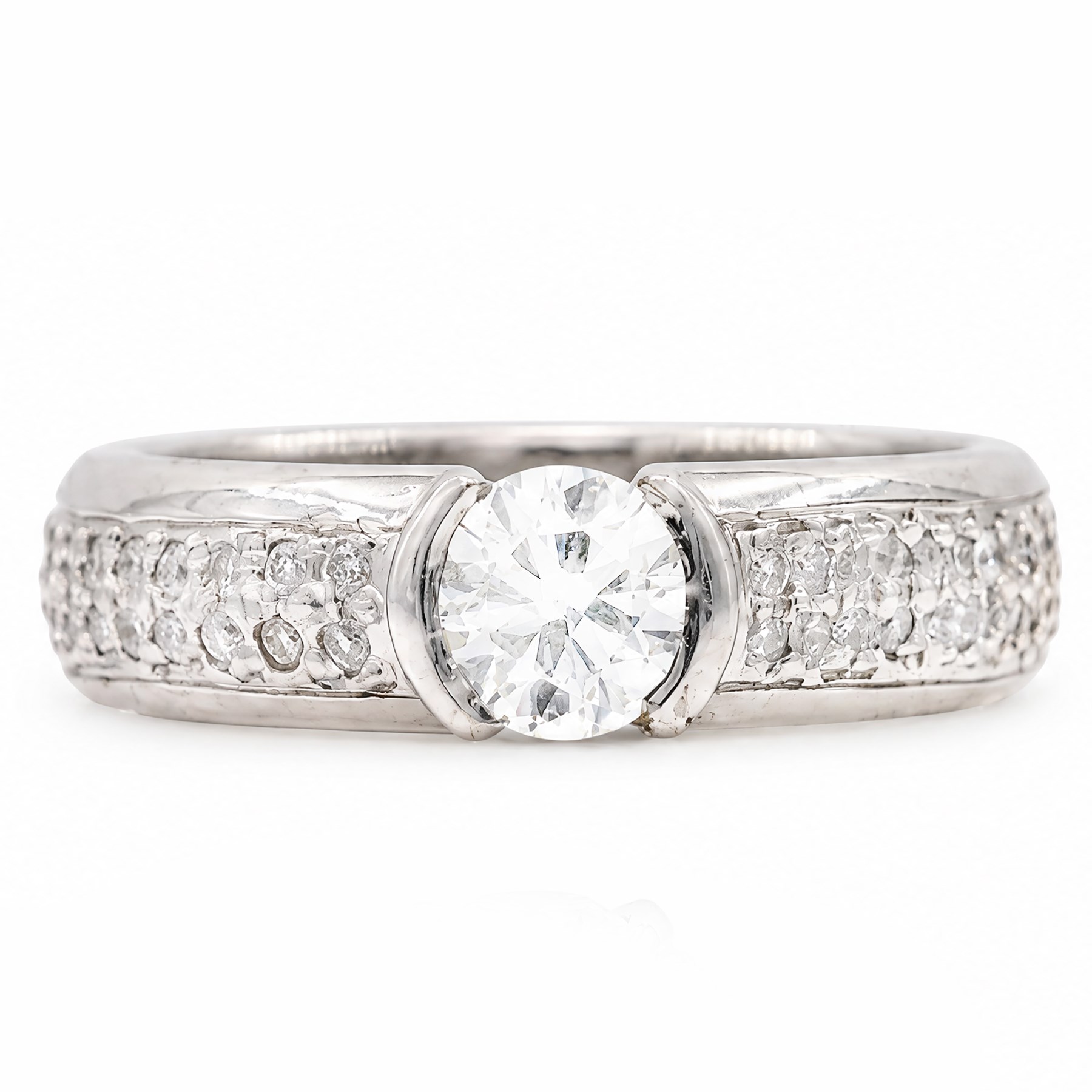 18ct white gold diamond ring, half bezel set with a single round brilliant cut diamond of approx 0.45 carat, with pave set round cut diamond shoulders, hallmarked
