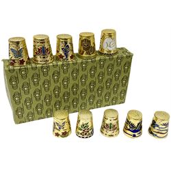 Ten cloisonné thimbles, decorated with animals, flowers, birds and butterflies  