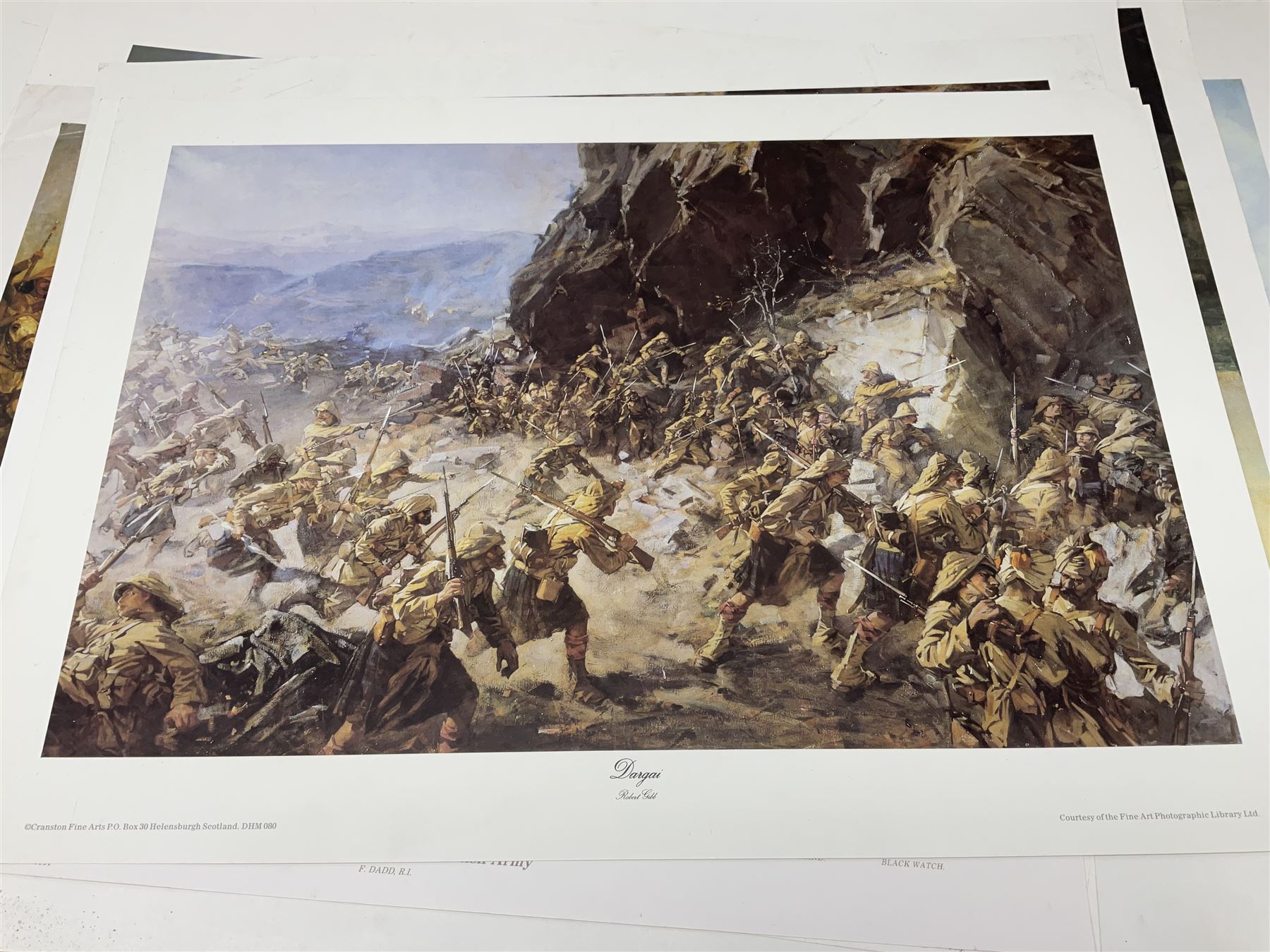 Large poster entitled 'Crests and Badges of the British Army in Daily Use 56 x 86cm; together with twenty-five colour prints of military interest including Crimean War, Boer War, WW2 etc; various sizes; all unframed