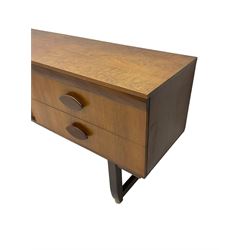 Mid-20th century circa. 1970s teak sideboard, rectangular top over four drawers with pointed elliptical handles, straight block supports joined by stretchers on castors