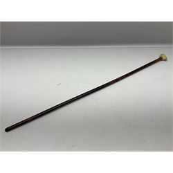 19th century malacca walking cane with scrimshaw handled in the form of a clenched fist holding a scroll, H86cm 