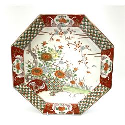 Japanese octagonal charger enamelled to the centre with flowers and blossom within a border of alternate diaper and floral panels W29.5cm
