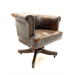 Early to mid 20th century swivel desk tub shaped chair, upholstered in brown leather