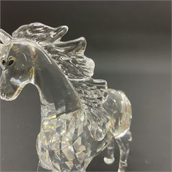 Swarovski Crystal animals, comprising white peacock, the tail with cascading blue flowers, perched eagle with yellow beak, ibex with frosted crystal horns and unicorn with frosted crystal horn, tallest H13cm