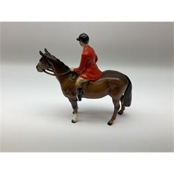 Beswick model of a huntswoman on grey horse model no 1730, and Beswick huntsman on brown horse model no 1501, both with printed mark beneath. 