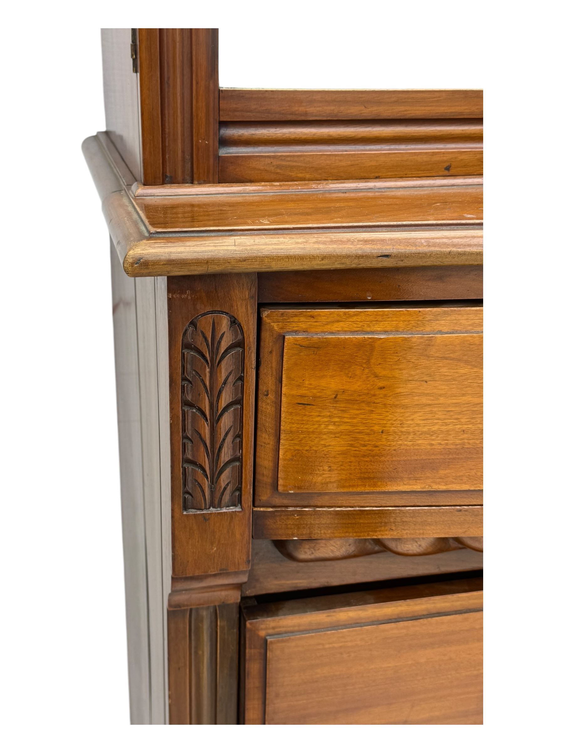 Victorian walnut dresser, projecting cornice over mirrored front, fitted with two short over two long drawers, on turned feet