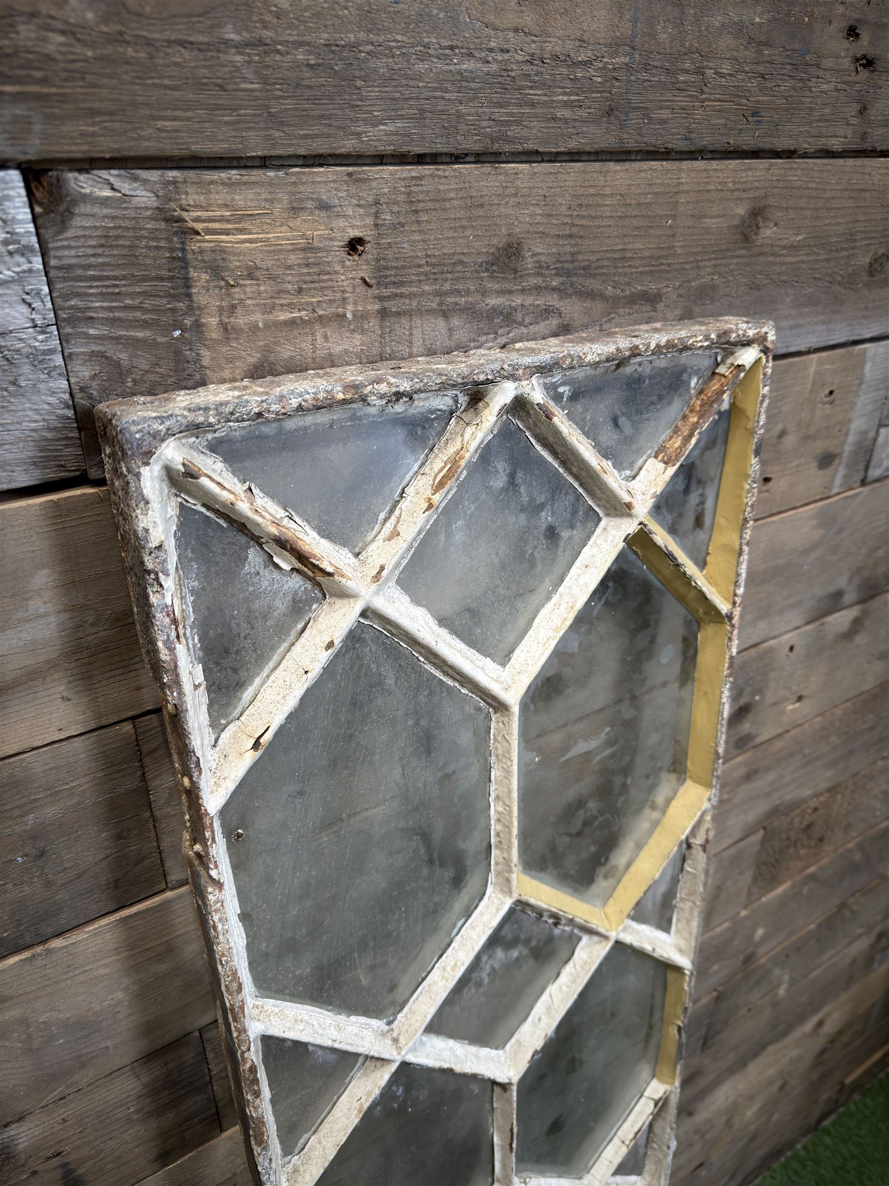 Four 19th century cast iron windows, lattice glazed in white painted finish, 