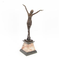 After Demétre Haralamb Chiparus (Romanian 1886-1947): Art Deco style bronze figure modelled as a dancer with raised arms, signed to the stepped bronze base and also bearing foundry stamp, upon a tapering marble plinth, overall H55cm
