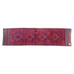 Afghan Meshwani runner, hand-knotted wool pile, indigo ground decorated with a vertical se...