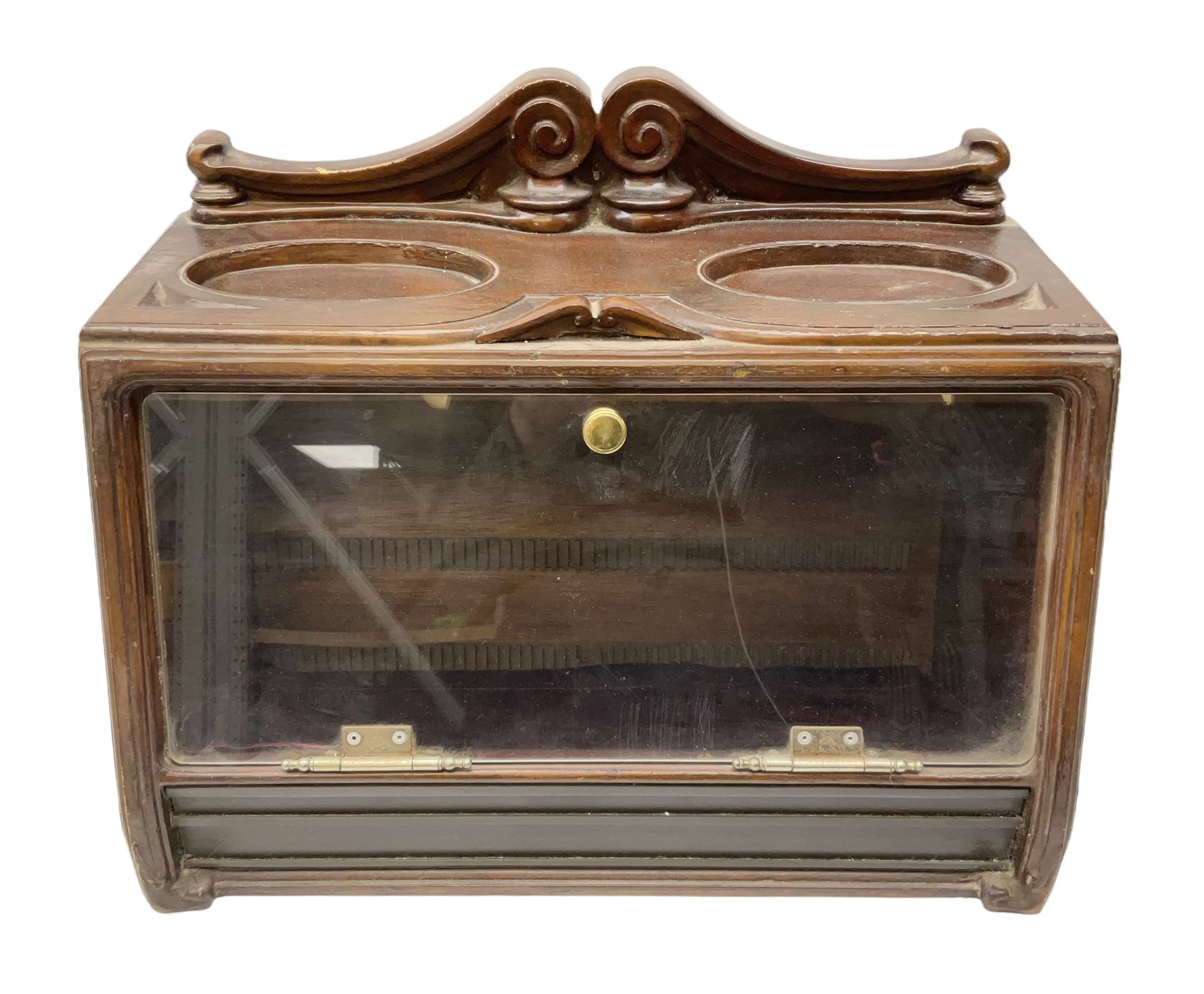 20th century Irish cigar shop display cabinet by Roger Aplin, Dublin, the box with hinged glazed front and decorative scroll top, H30.5cm