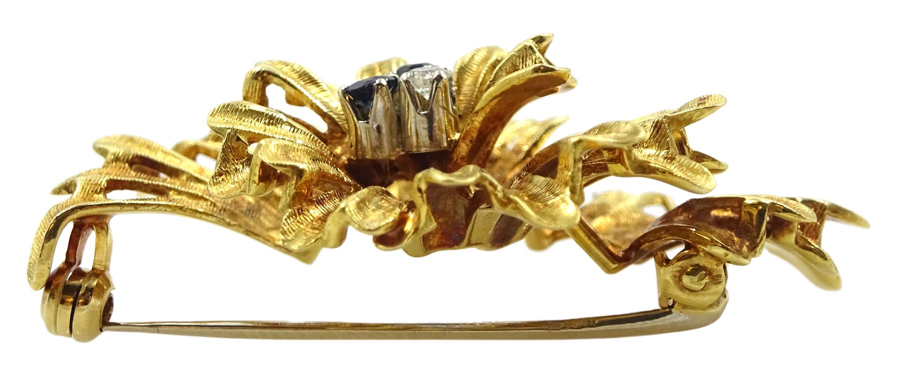 18ct gold three stone diamond and sapphire stylised flower brooch, London import mark 1969