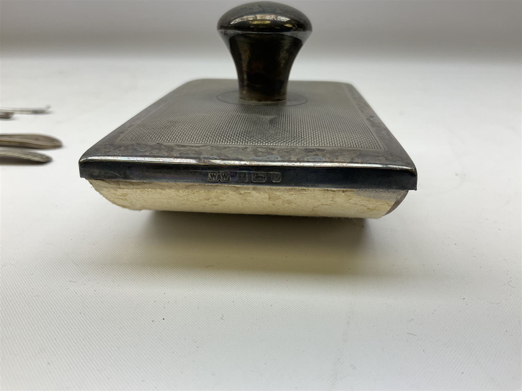 Modern silver mounted blotter, with engine turned decoration, hallmarked Birmingham 1991, small group of silver flatware, and a silver plated cigarette case, approximate weighable silver 71.5 grams
