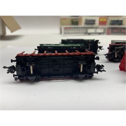 Fleischmann ‘N’ gauge ‘Piccolo’ - sixteen carriages, wagons and cars comprising nos. 8051, 8052, 8055, 8064, 8119K, 8127, 8128, 8129, 8202, 8211, 8224, 8240, 8281, 8301, 8500, 9372; along with Minitrix N503 Shock Van and 13576 6 ton Mineral Wagon; boxed and loose (18) 