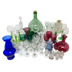Collection of glassware, to include large green glass bottle, coloured drinking glasses, 18th century style drinking glasses, etc 