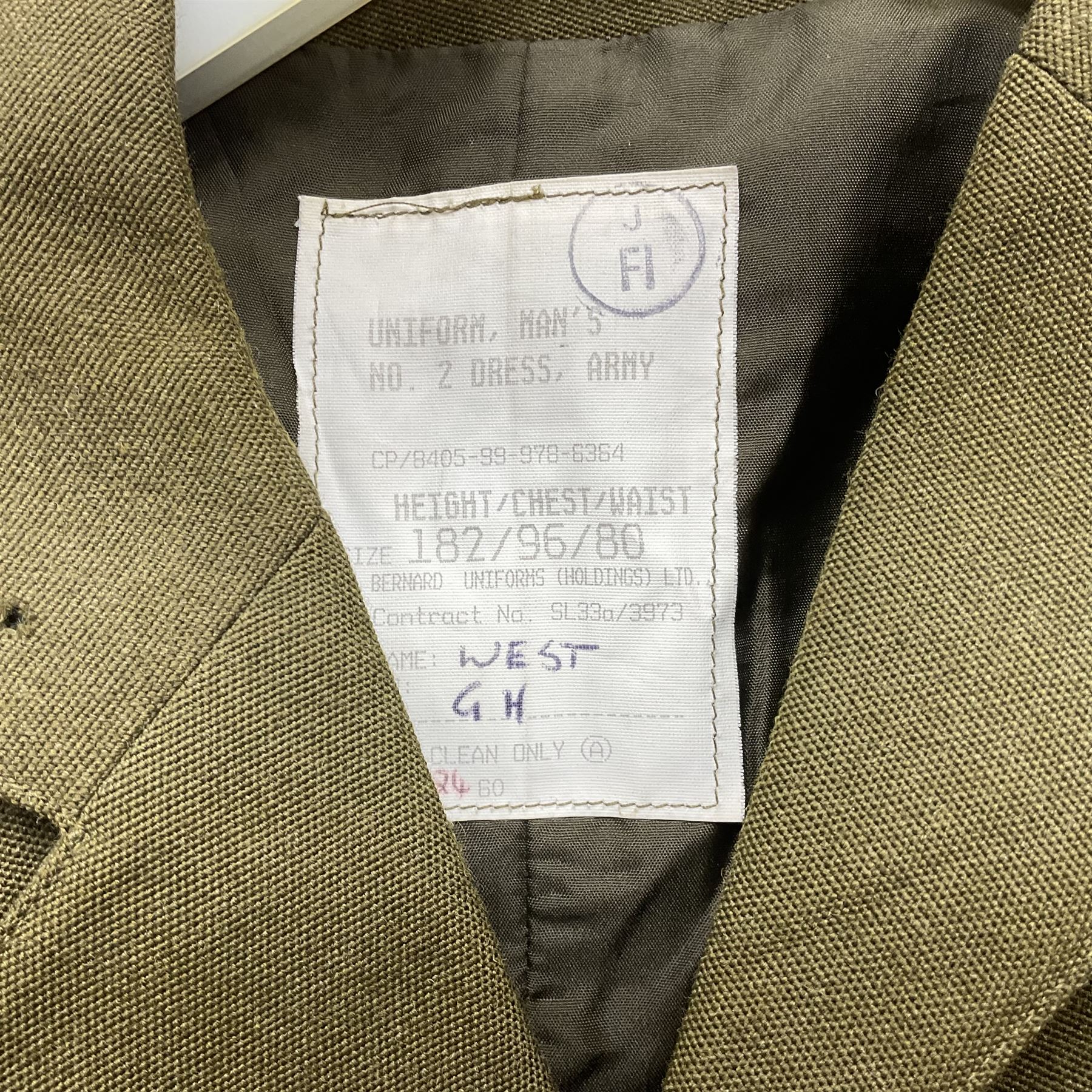 Two post-WWII British Army No.2 Dress tunics, one with Green Howards buttons; army shirt dated 1951; Royal Fleet Auxilliary jacket with trousers; three RAF/WAAF uniforms and RAF Greatcoat; and three canvas/webbing bags, two dated 1943 & 1945