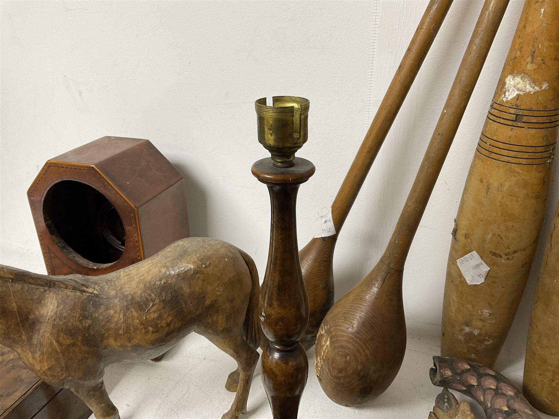 Taxidermy armadillo basket, mahogany clock case, burr walnut box, wooden exercise pins, satinwood pen tray with turned handles and a collection of other wooden collectables