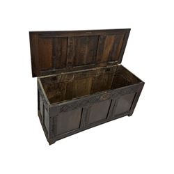 18th-century carved oak blanket chest with hand-carved floral and leaf motifs 