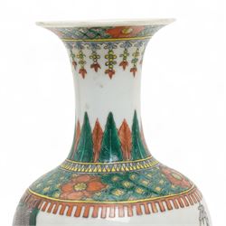 Chinese Kangxi famille verte vase of baluster form with fluted rim, decorated with sage and attendants within a trellis border, with four character Kangxi double ring mark beneath, H31cm 