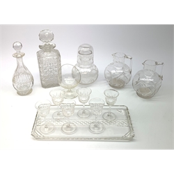 A set of six Thomas Webb liquor cut glasses, together with a matching liquor decanter, each marked, glasses H9.5cm, decanter H21cm, together with an Edwardian acid etched carafe and beaker, two Victorian square bulbous form writhern twist jugs, a cut glass decanter, etc. 