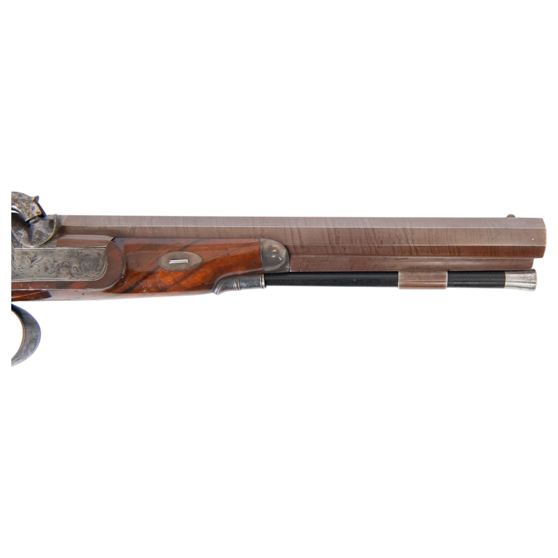 Pair of cased British officers' percussion cap dueling pistols by Braggs of London   (1932-1842), with 24cms octagonal Damascus steel sighted barrels with original browning, marked along the top Braggs 36 High Holborn London, ebony ramrods with steel caps and brass tips beneath, hammer, tang and trigger guard engraved with floral scrolls, figured walnut half stocks with chequered grips and vacant white metal cartouches, contained within a brass bound mahogany case with makers label to the lid, lined in green baize and containing bullet mould, powder flask, ram rod, percussion caps, case key and lead balls, pistol overall L40cm 