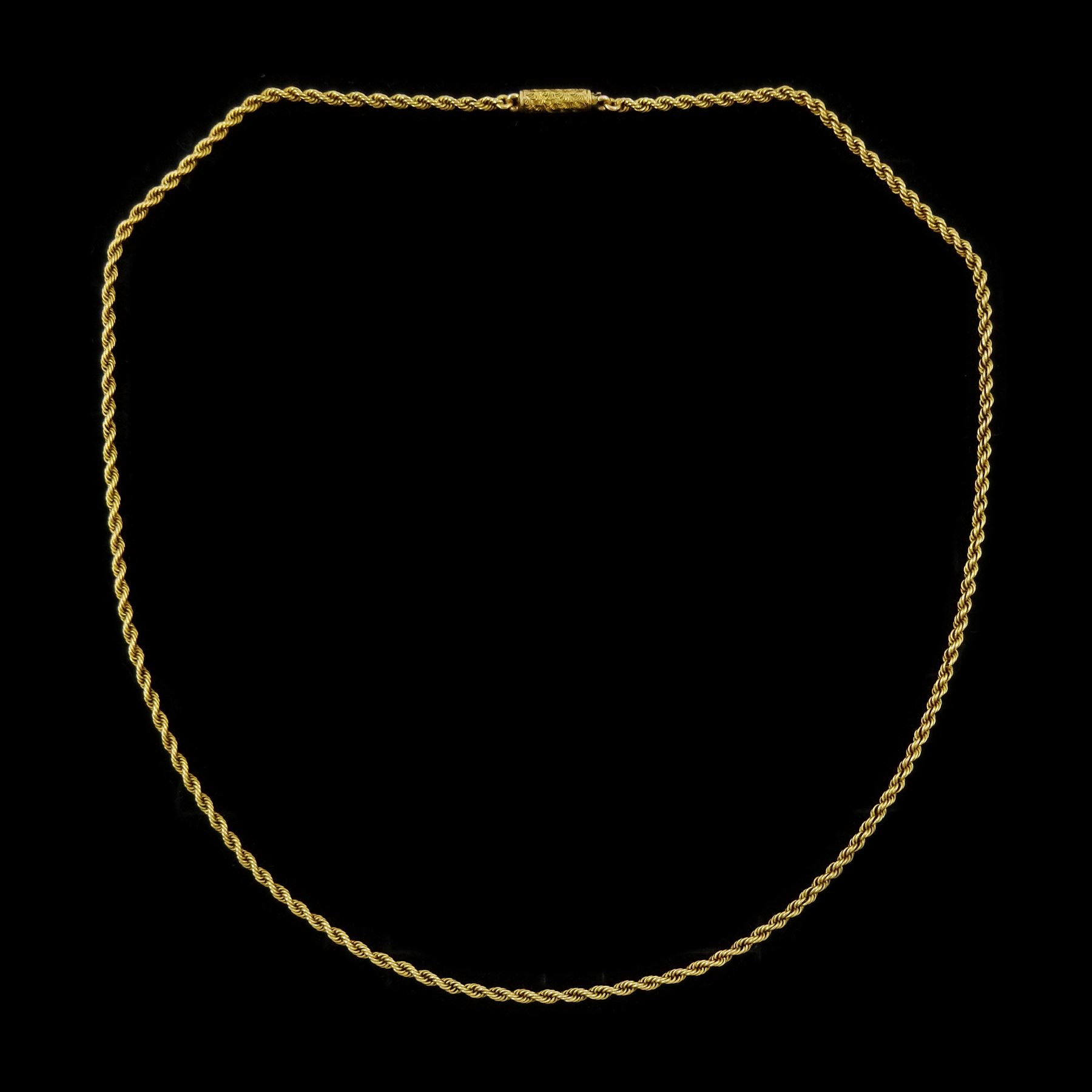Early 20th century gold rope twist chain necklace, the barrel clasp with engraved decoration, stamped 15