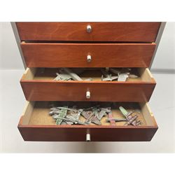 Tabletop chest with nine drawers, with Dinky toy and other die-cast model parts, drawers H62cm