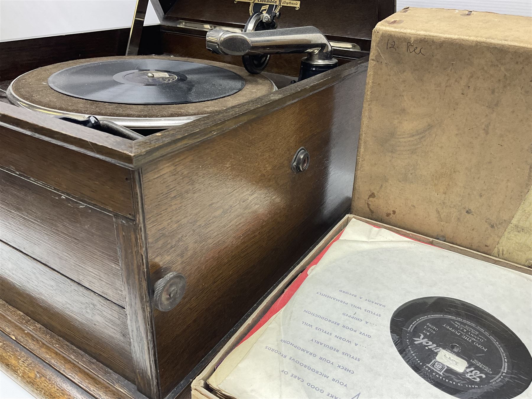 Columbia Grafonola tabletop hornless gramophone, with detachable winding handle, together with a collection of records 