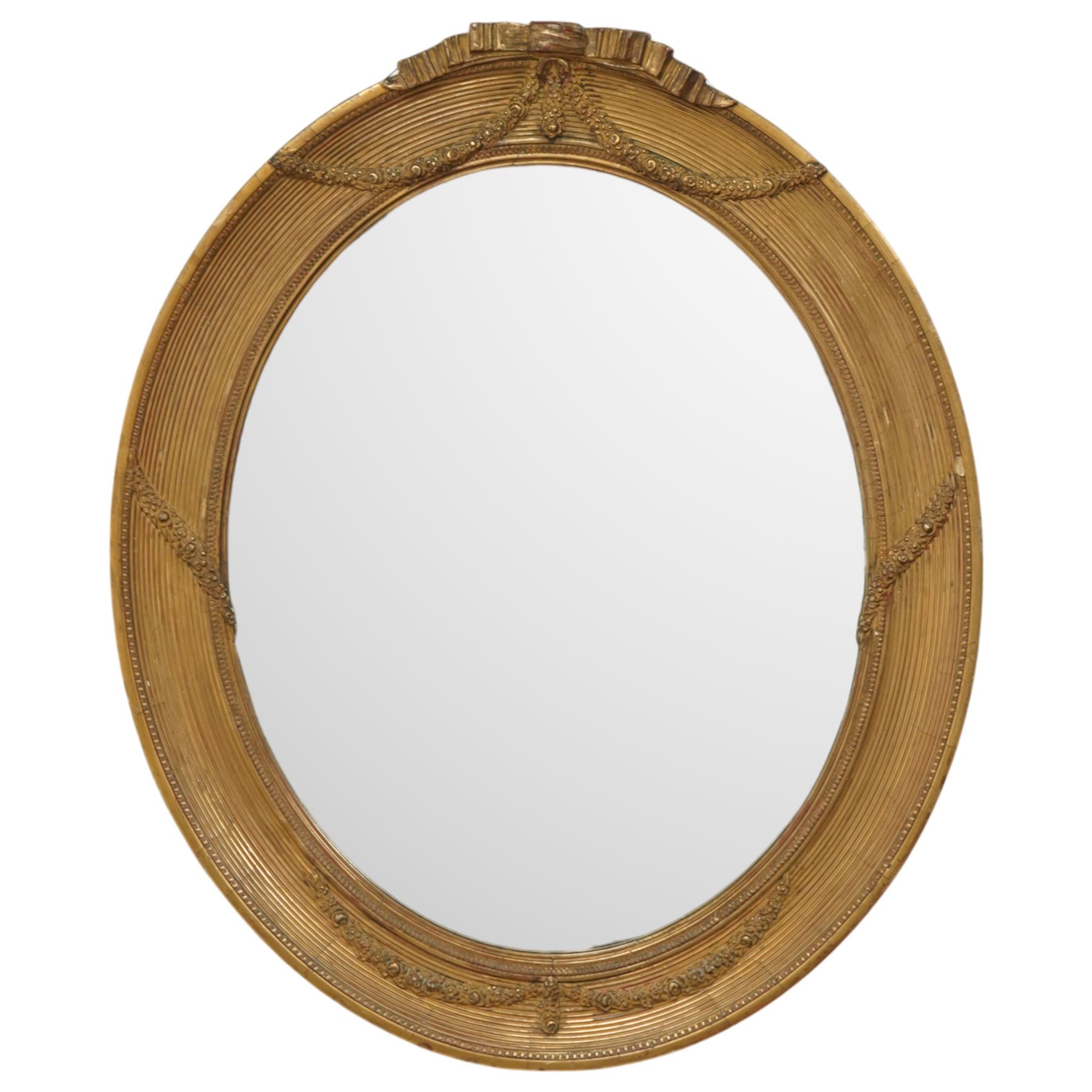 Edwardian neoclassical style oval giltwood mirror, ribbed frame, decorated with floral wreaths and ribbons 68x57cm