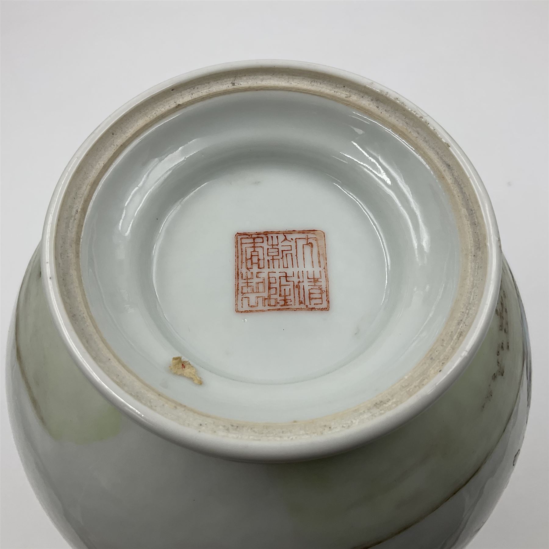 Pair of Chinese Republic porcelain vases, each painted in Famille Rose enamels with pairs of pigeons amidst peony, rock, flowering plants and leafy branches, possibly Qianlong seal beneath, H22cm 