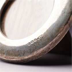 Silver topped glass trinket jar, small circular photograph frame and dessert fork